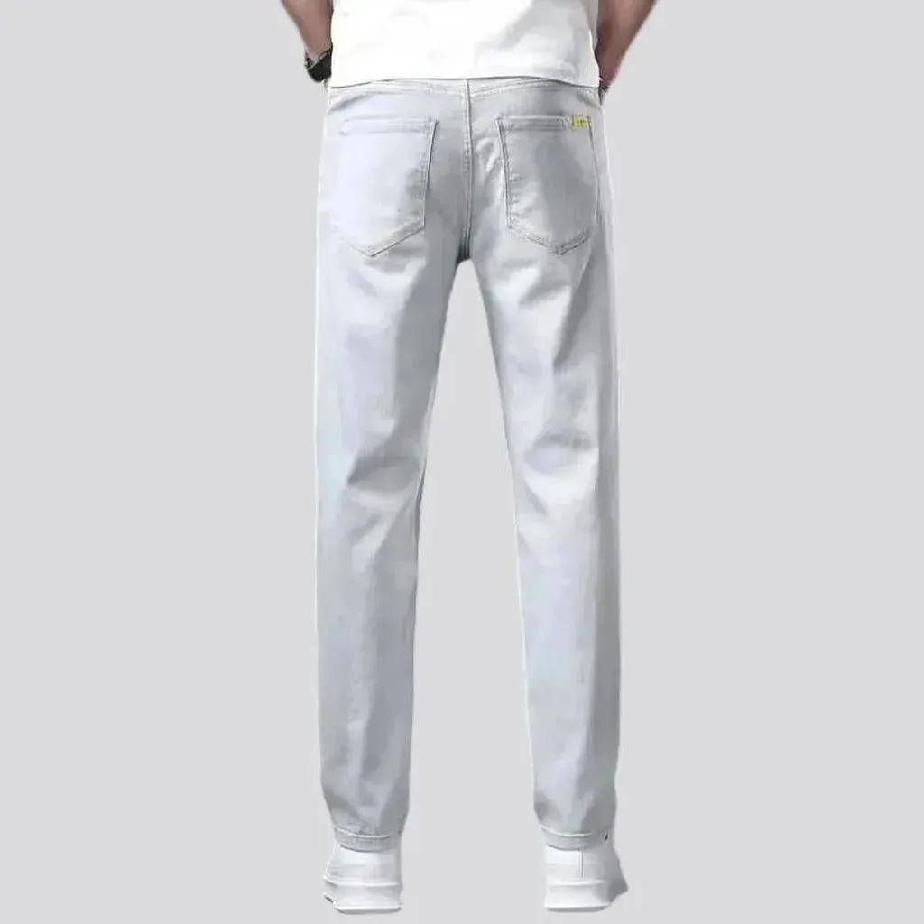 Loose men's light-grey jeans