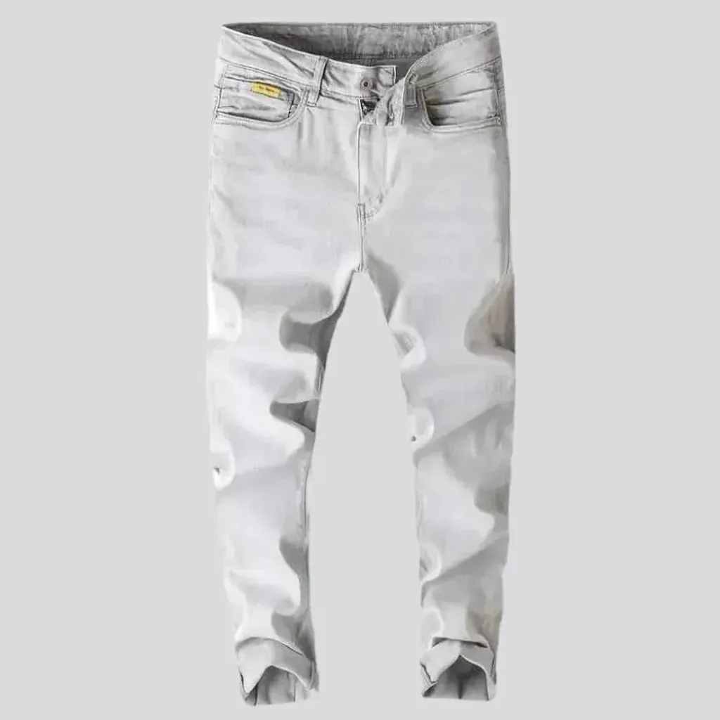 Loose men's light-grey jeans
