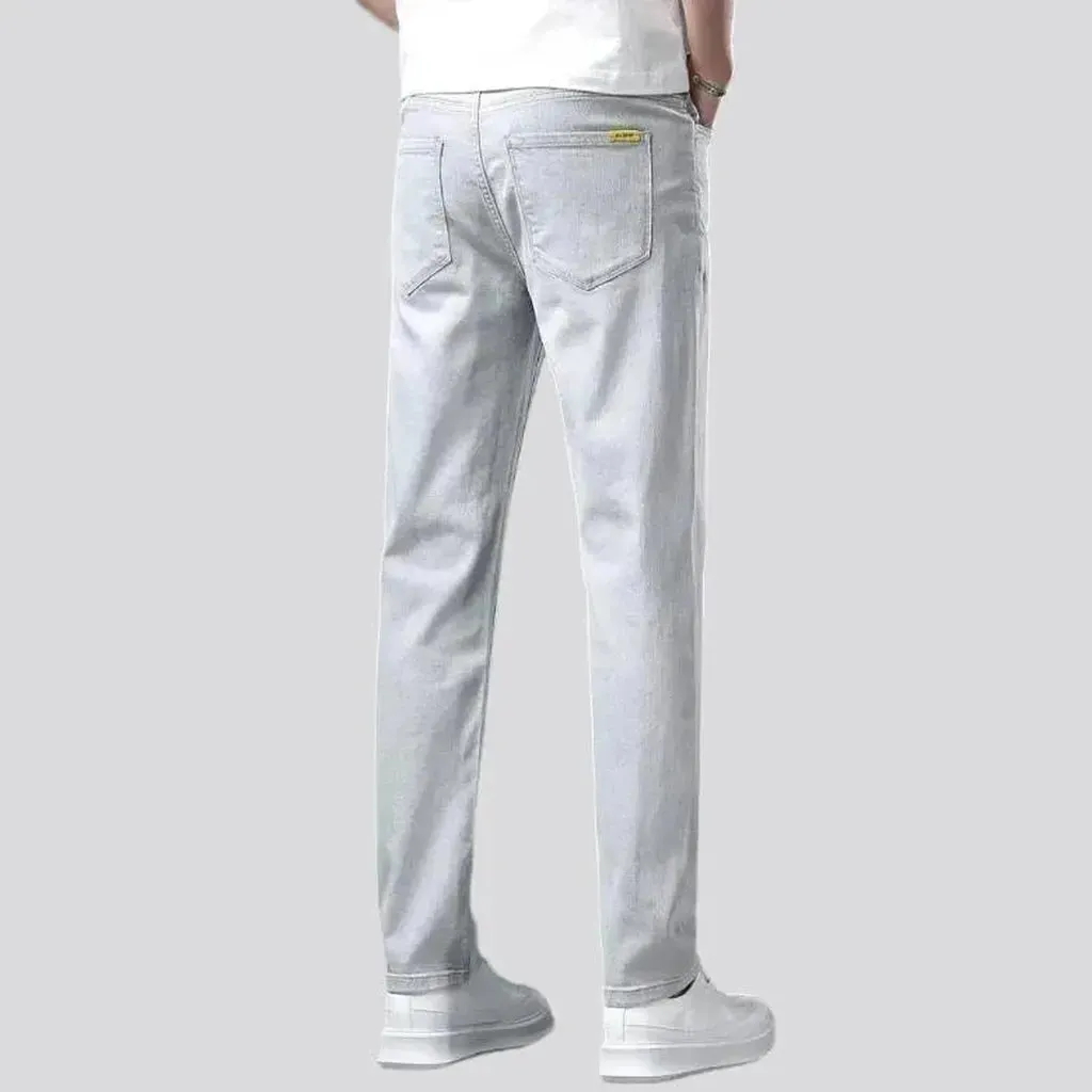 Loose men's light-grey jeans