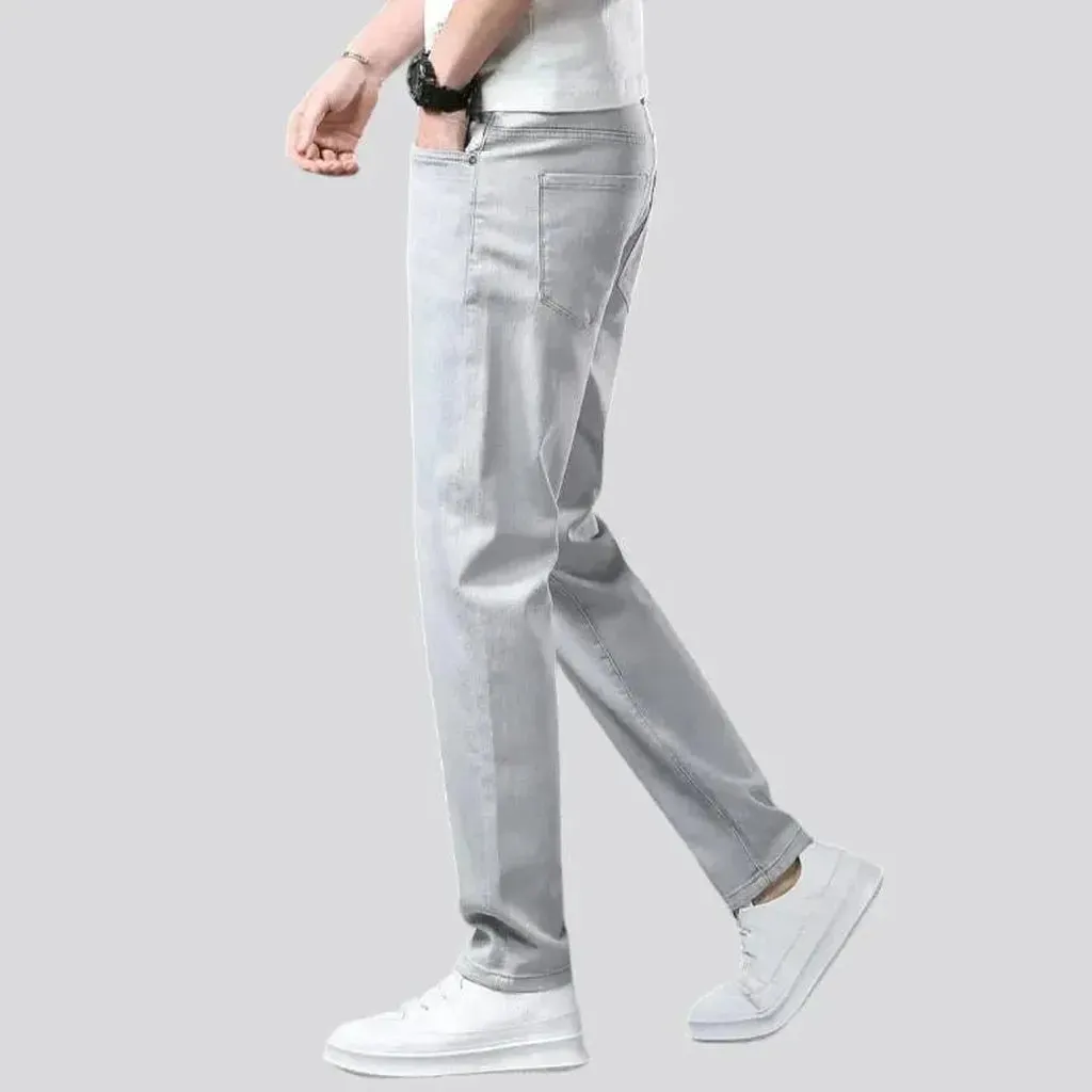 Loose men's light-grey jeans