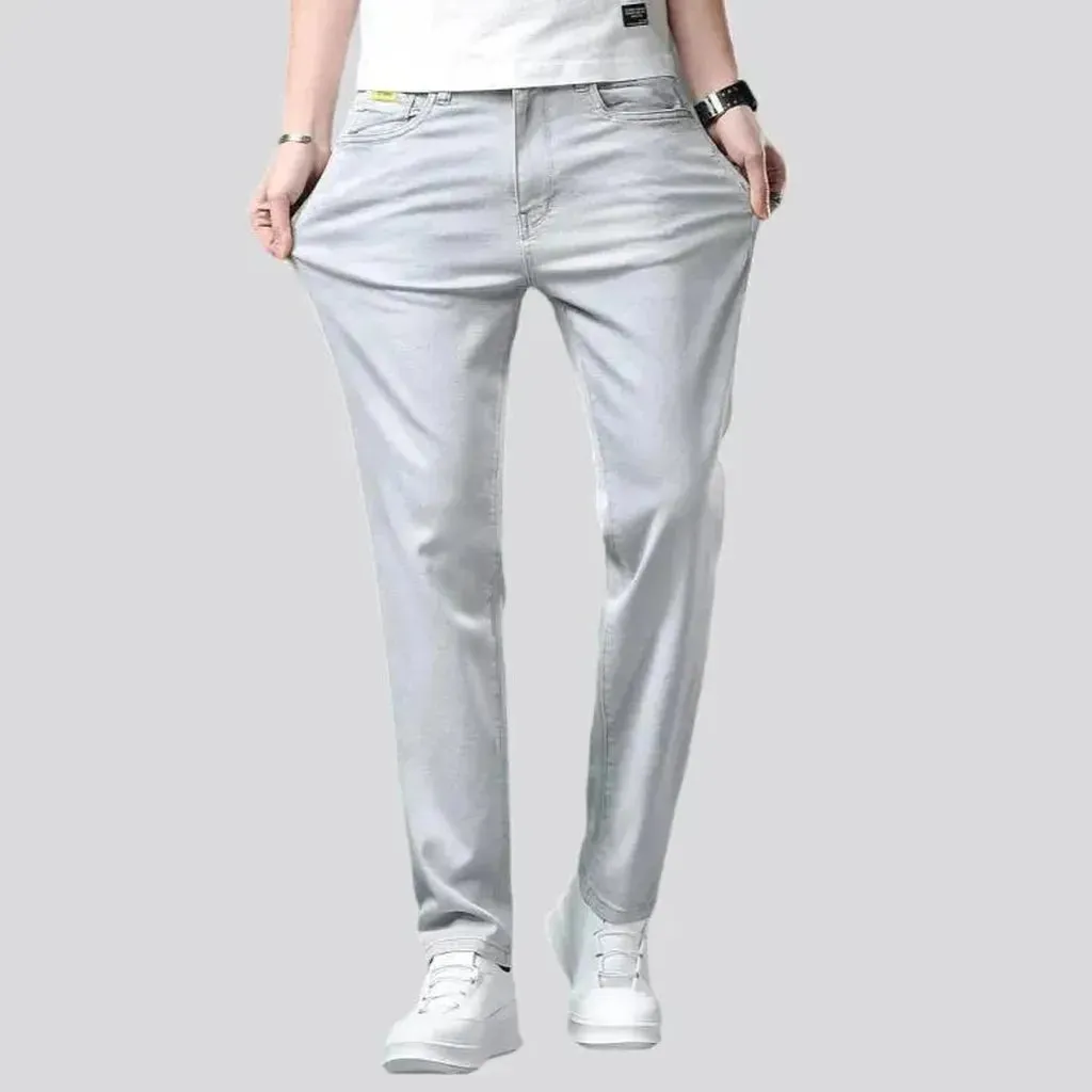Loose men's light-grey jeans